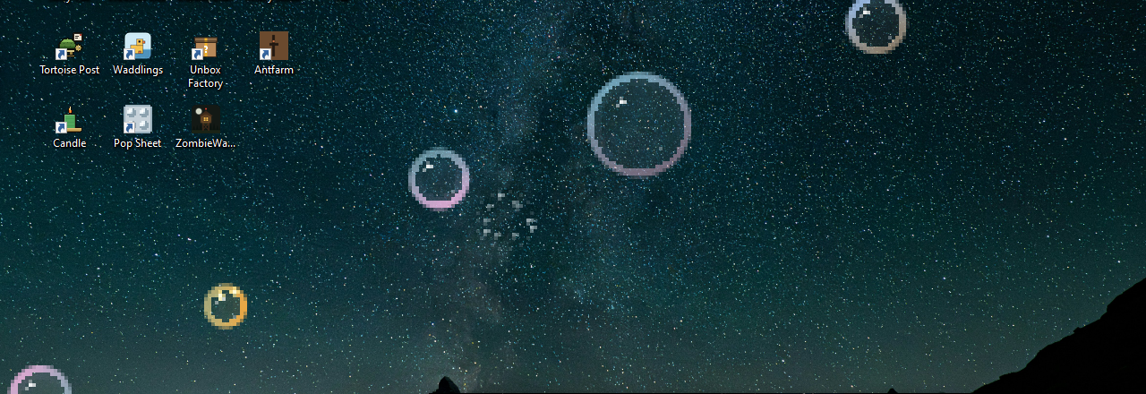 Bubble Drift: soap bubbles drifting up over a starfield desktop